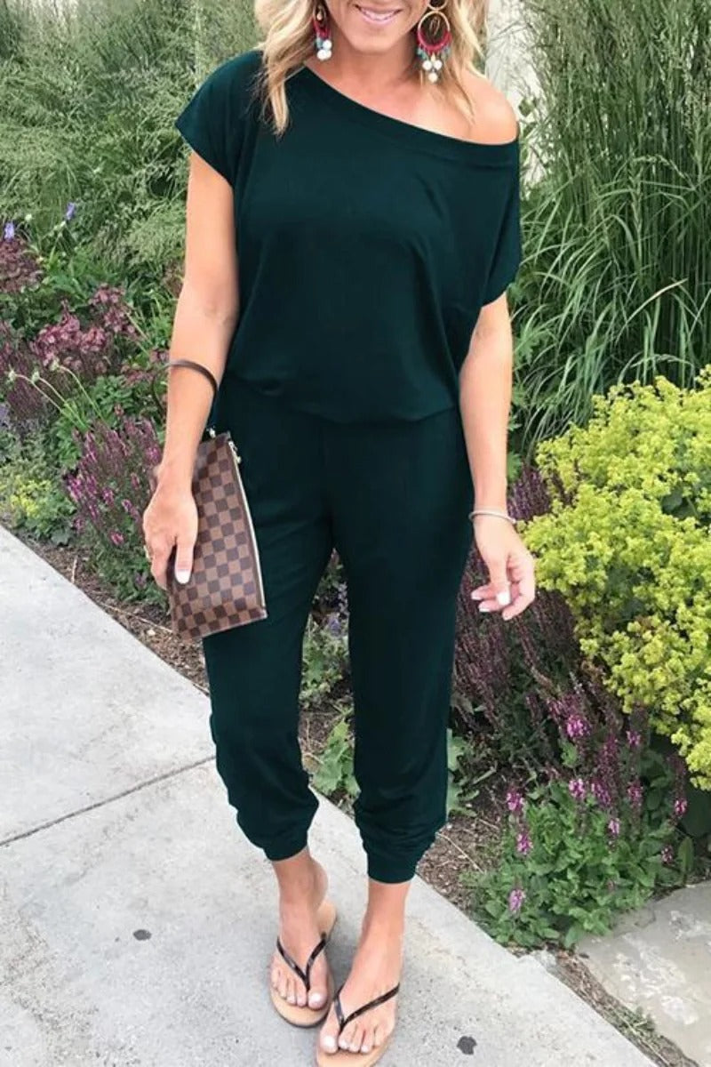 Lös jumpsuit med axelavslut för kvinnor