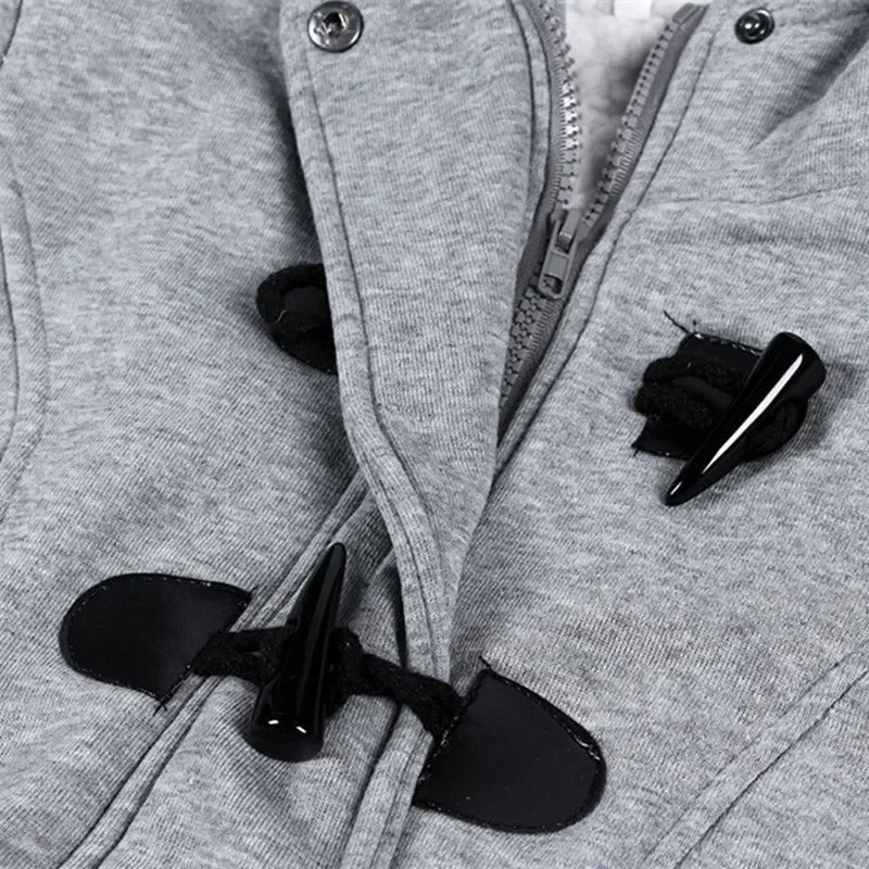 Avslappnad vinterjacka med knappar för kvinnor