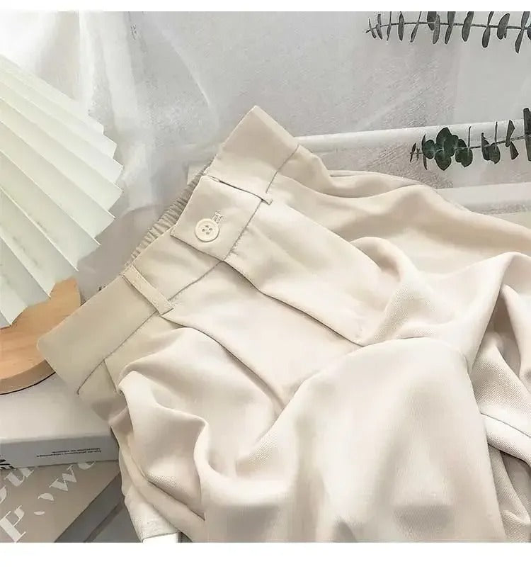 Elastiska byxor med hög midja för kvinnor