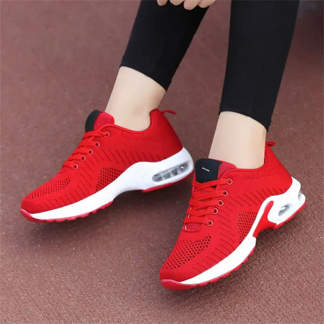 Friidrottsskor med hålfotsstöd för damer