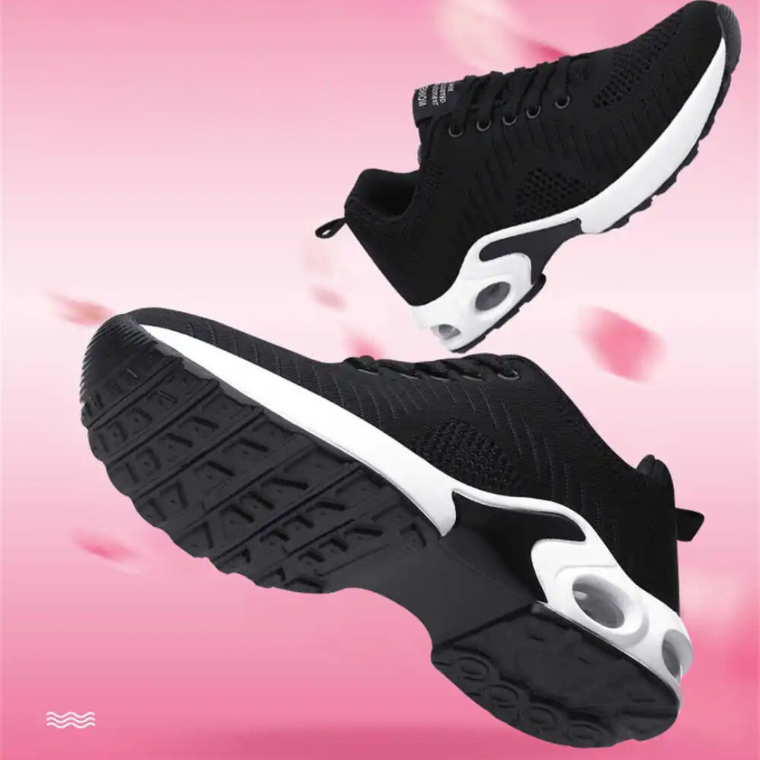 Friidrottsskor med hålfotsstöd för damer