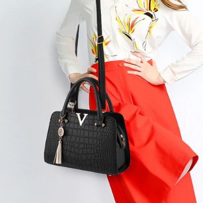 Väska i krokodilskinn