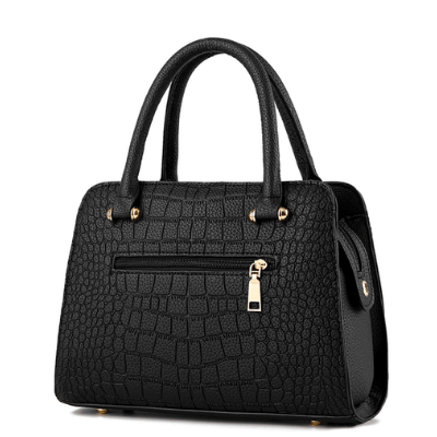 Väska i krokodilskinn