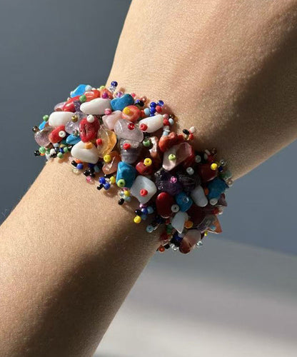 Damarmband med Regnbågsmönster och Asymmetrisk Design 3