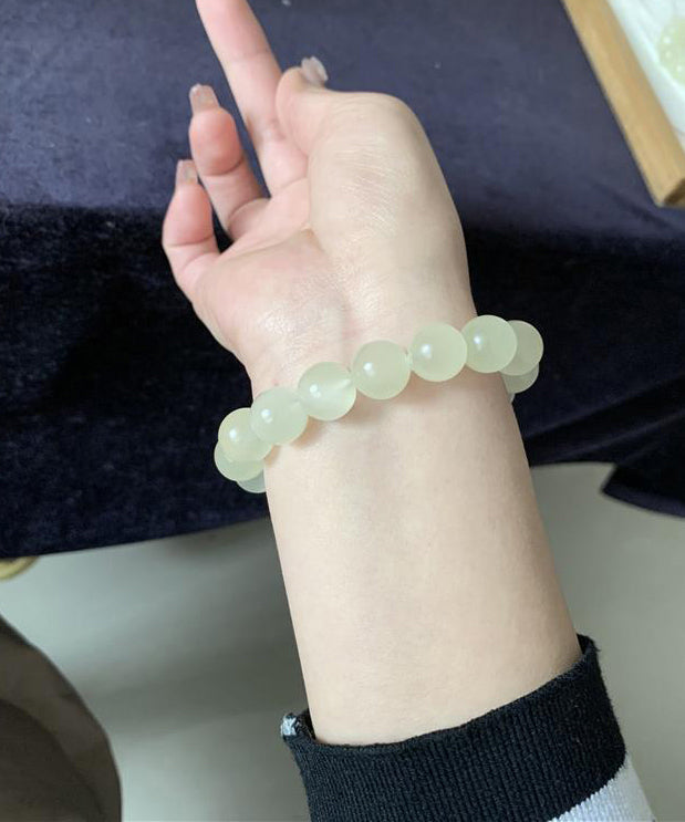 Damarmband med genomskinliga jadepärlor och kattögaeffekt 3