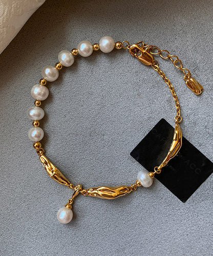 Damarmband med pärlcharm och metallpatch 3