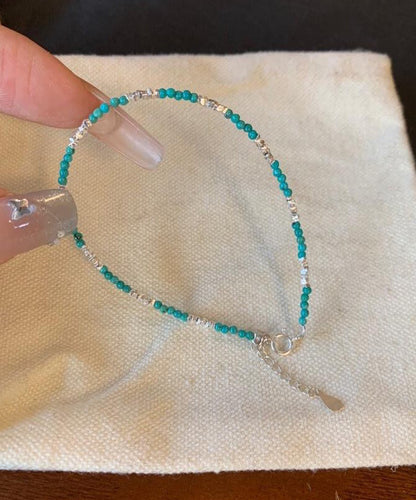 Damarmband med turkos och silverberlocker kort stil 1