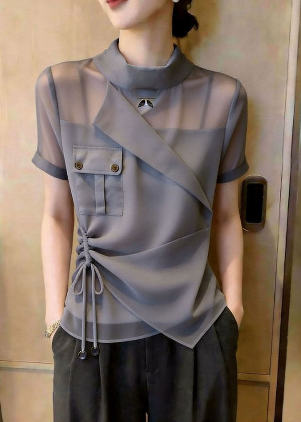 Damblus med asymmetrisk design och dragsko 2