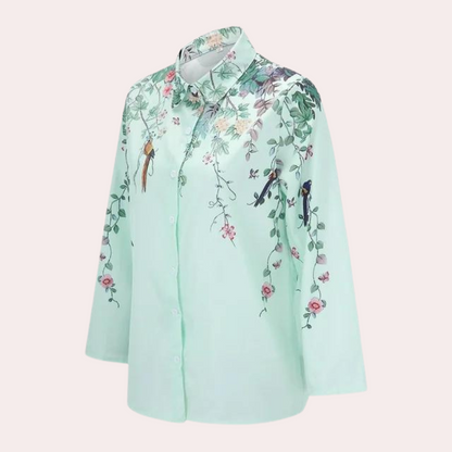 Damblus med blommiga broderier och puffärmar 4