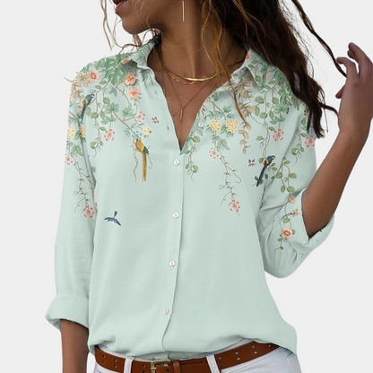 Damblus med blommiga broderier och puffärmar 5