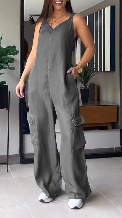 Damernas Denim Jumpsuit med V-hals och Rygglös Design 8