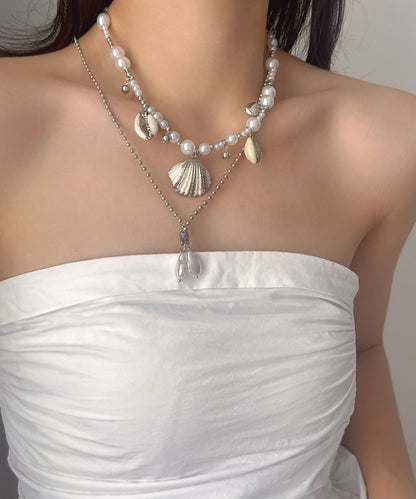 Damhalsband med dubbla lager och snäckskalspärla i modern design 4