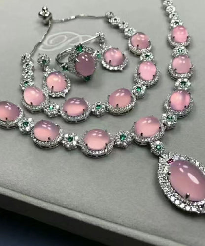 Damhalsband med fyrdelad zirkonsten och hänge 1
