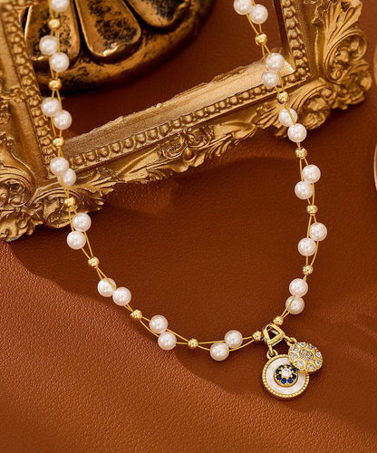 Damhalsband med pärl- och zirkondetaljer 1