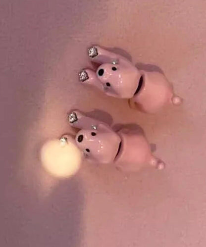 Damörhängen med hundmotiv och droppande glasyrdesign 4