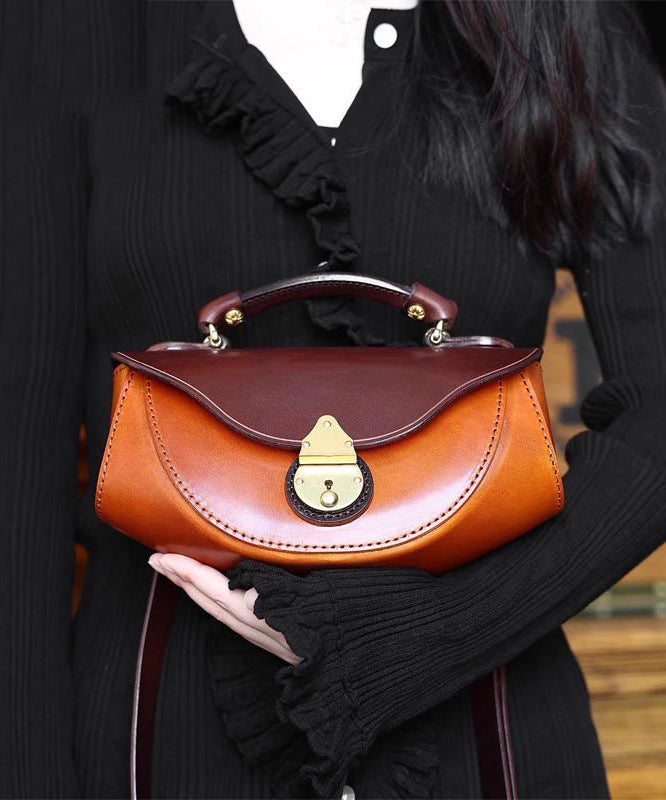 Handväska i kalvläder med stilren design 0