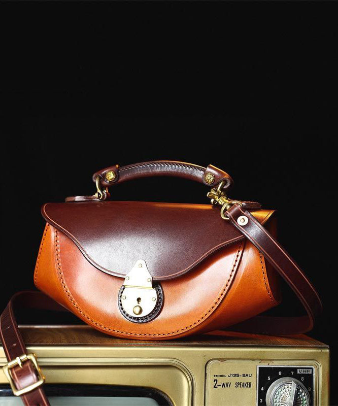 Handväska i kalvläder med stilren design 1