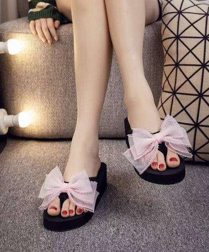 Kvinnors Plattform Flip Flops med Rosett 1