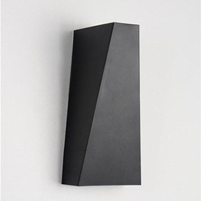 Minimalistisk geometrisk vägglampa