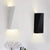 Minimalistisk geometrisk vägglampa