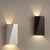 Minimalistisk geometrisk vägglampa