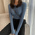 Knappstickad pullover för kvinnor