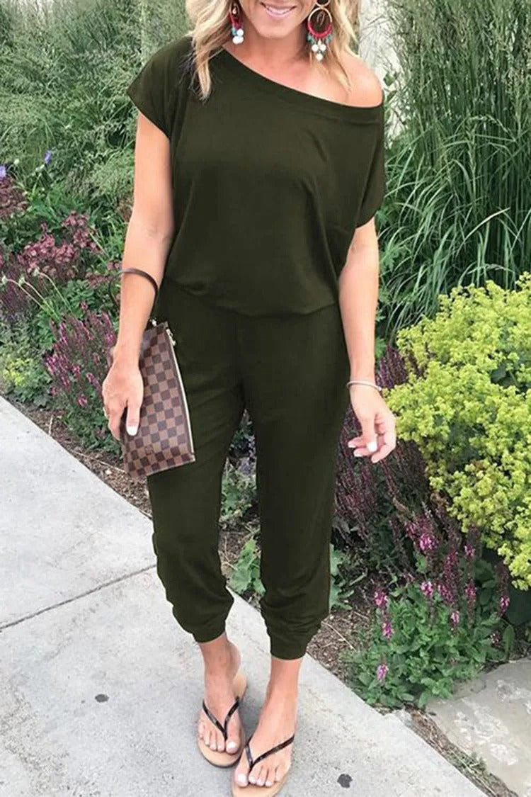 Lös jumpsuit med axelavslut för kvinnor