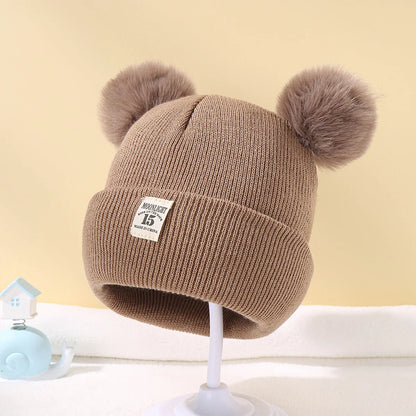 Ullstil Stickad babymössa