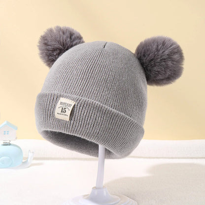 Ullstil Stickad babymössa
