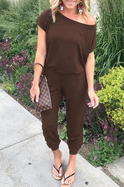 Lös jumpsuit med axelavslut för kvinnor