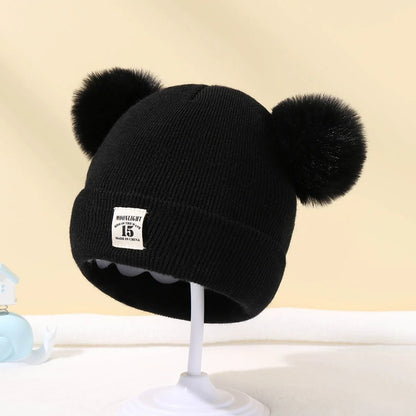 Ullstil Stickad babymössa