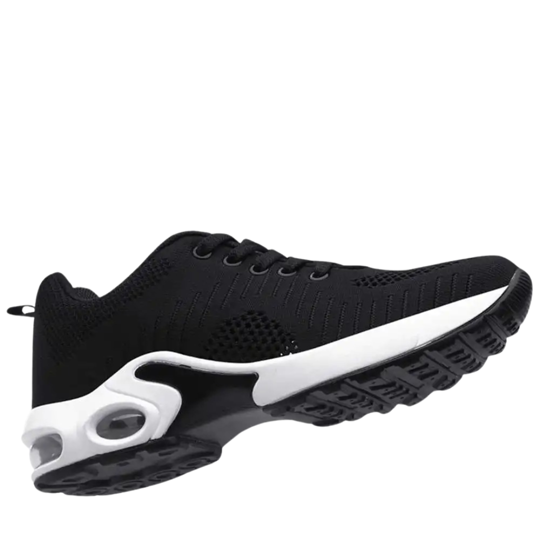 Friidrottsskor med hålfotsstöd för damer