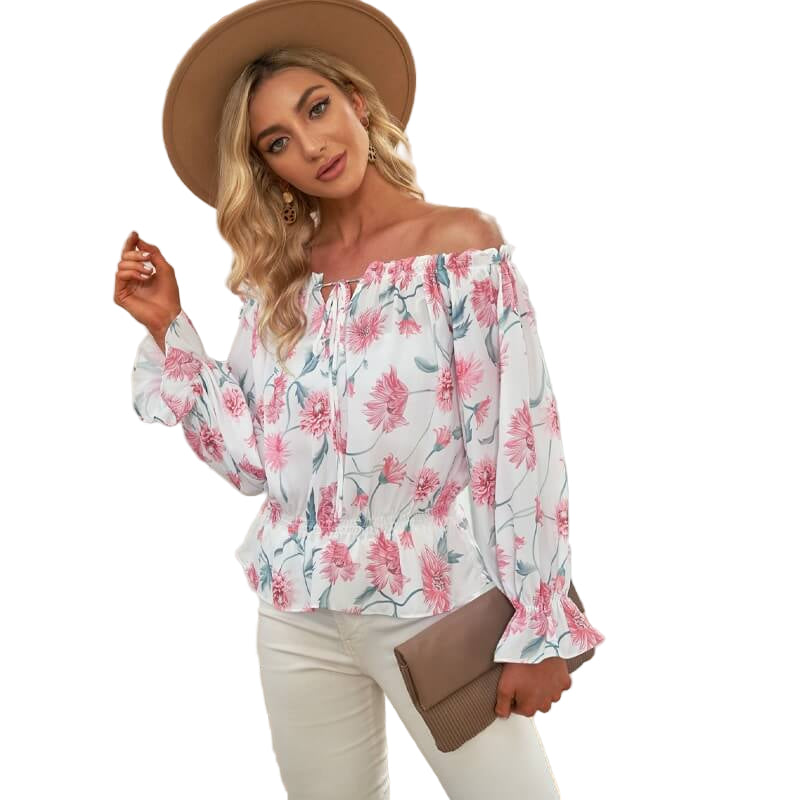 Blus med blommig ruffle ärm