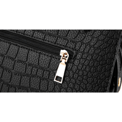 Väska i krokodilskinn