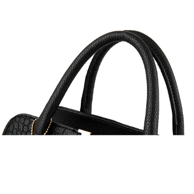 Väska i krokodilskinn