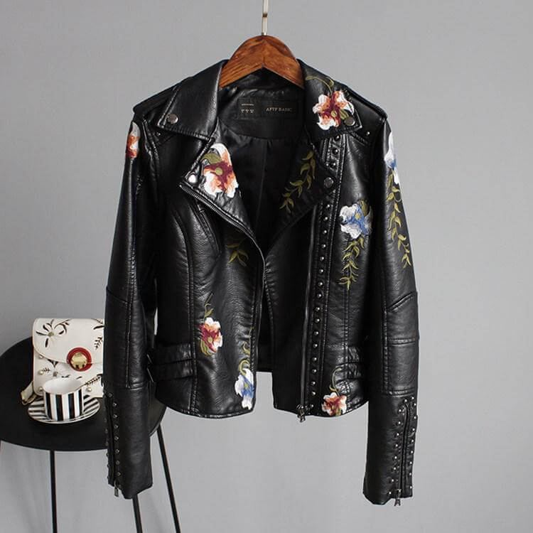 Läderstil jacka med blommigt tryck och broderi
