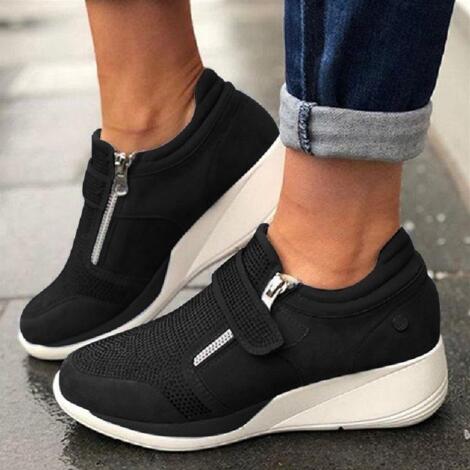 Kvinnor med dragkedja på plattformen Sneakers