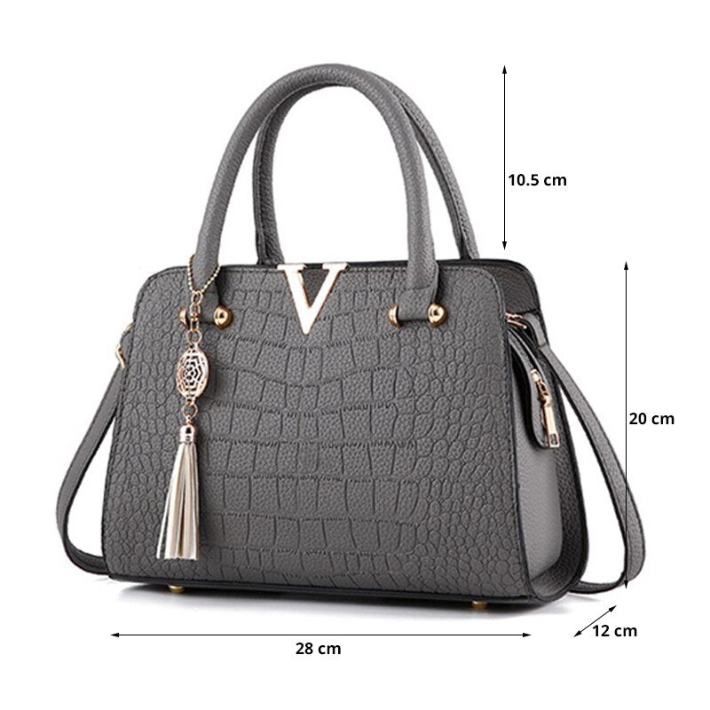 Väska i krokodilskinn