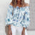 Blus med blommig ruffle ärm