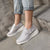 Kvinnor med dragkedja på plattformen Sneakers